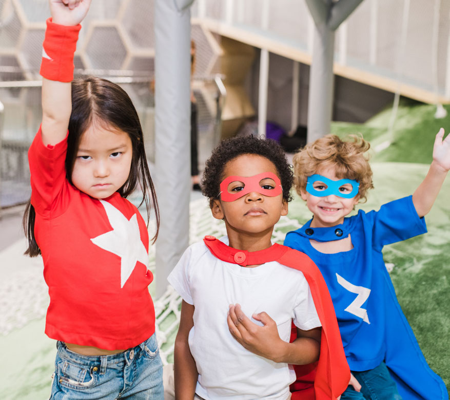 kids dressed as superheroes