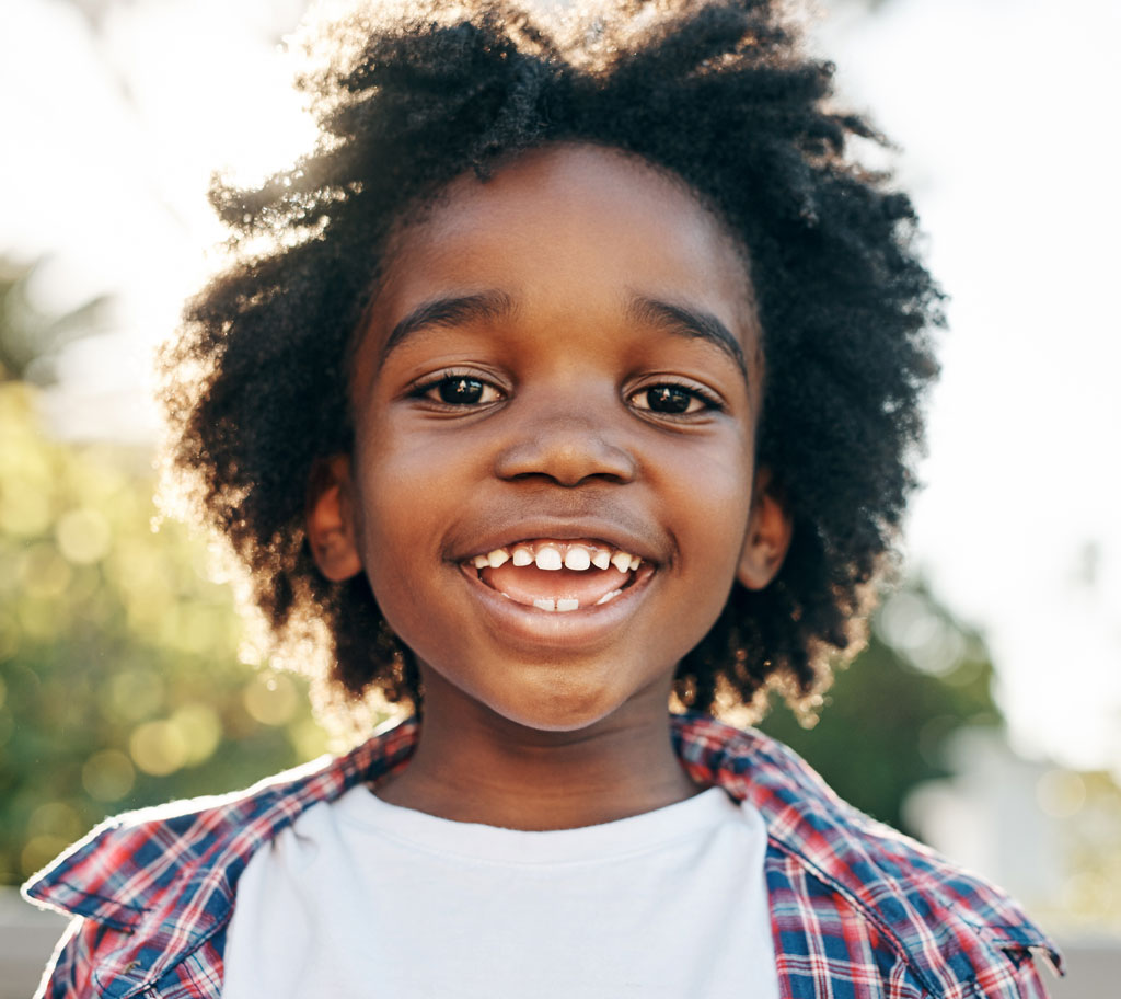 smiling child in flannel