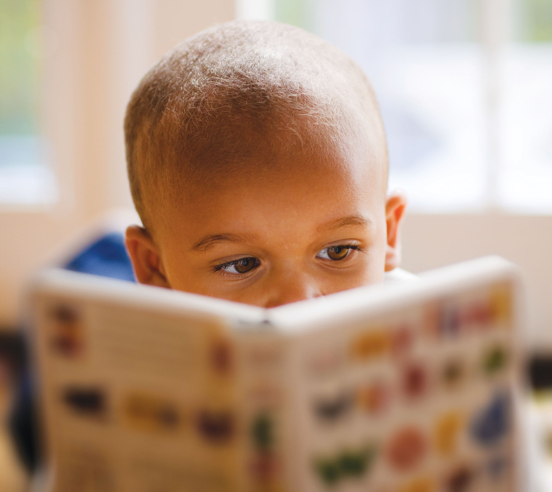 African-American boy reading