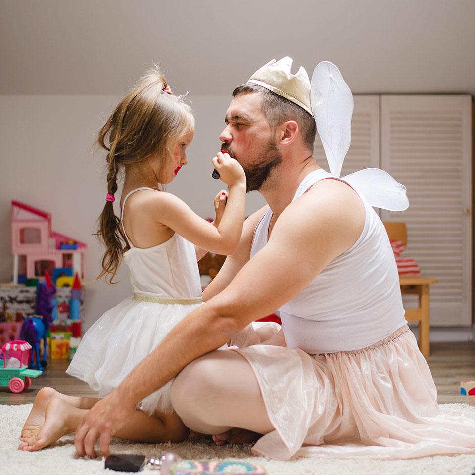 child and dad dressed up 