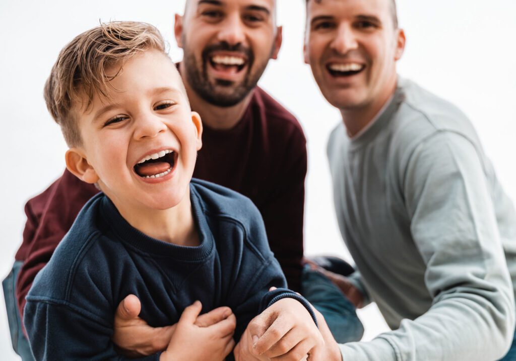 laughing parents with toddler